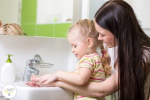 38355178 - kid and mother washing hands with soap in bathroom